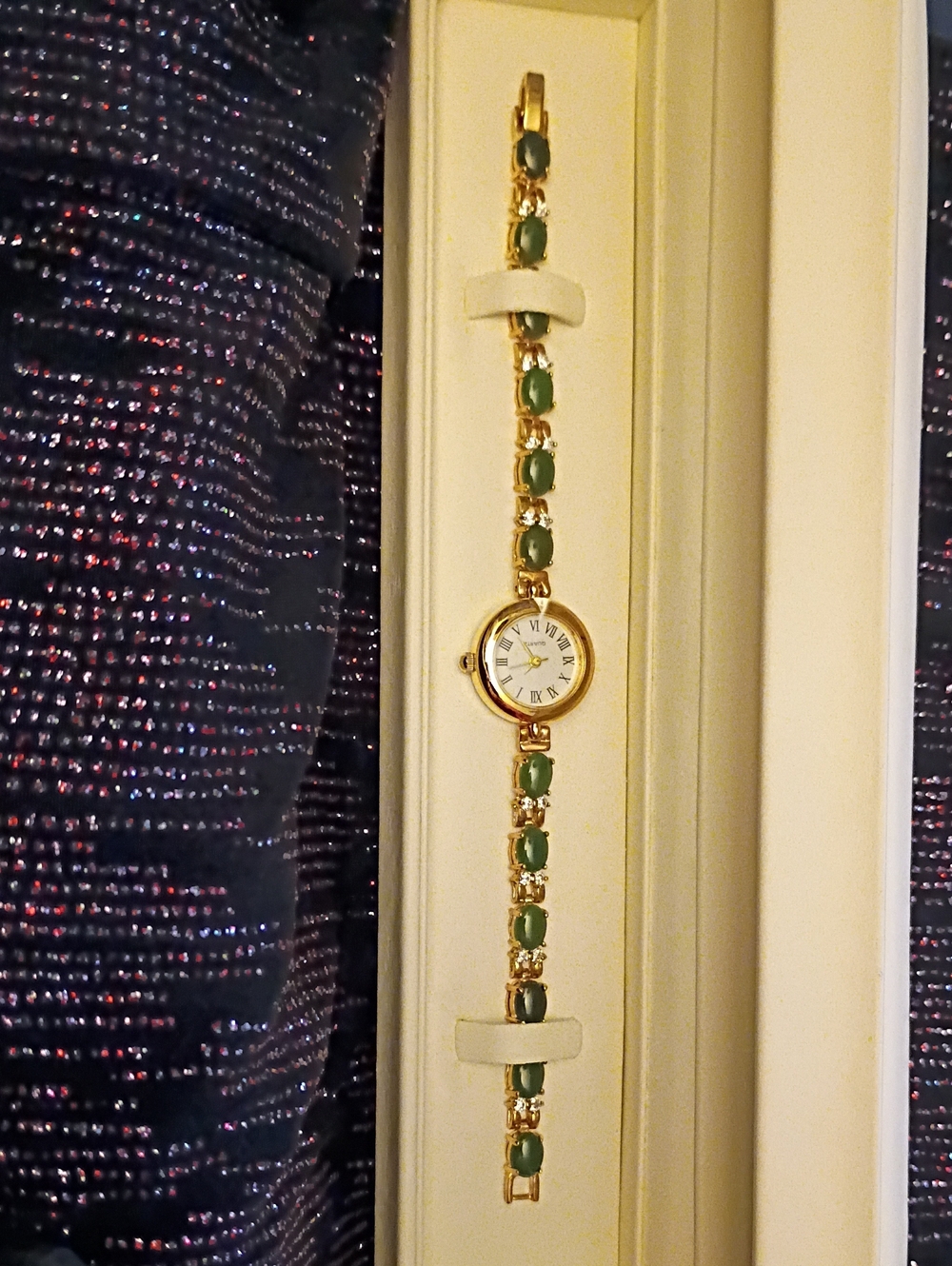 Gold-Tone Women’s Bracelet Watch with Green Stones